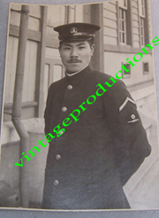 WWII Japanese Navy CPO Wearing Blue Uniform With Insignia Photo