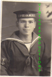 Late WWII Japanese Navy Sailor In Studio Setting With Aviation Background Photo