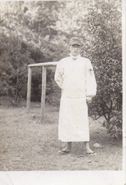 WWII Era Army Soldier Wearing Medical Robe Photo