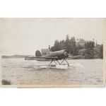 Lindbergh and Wife Land in Amphibious Plane Press Photo